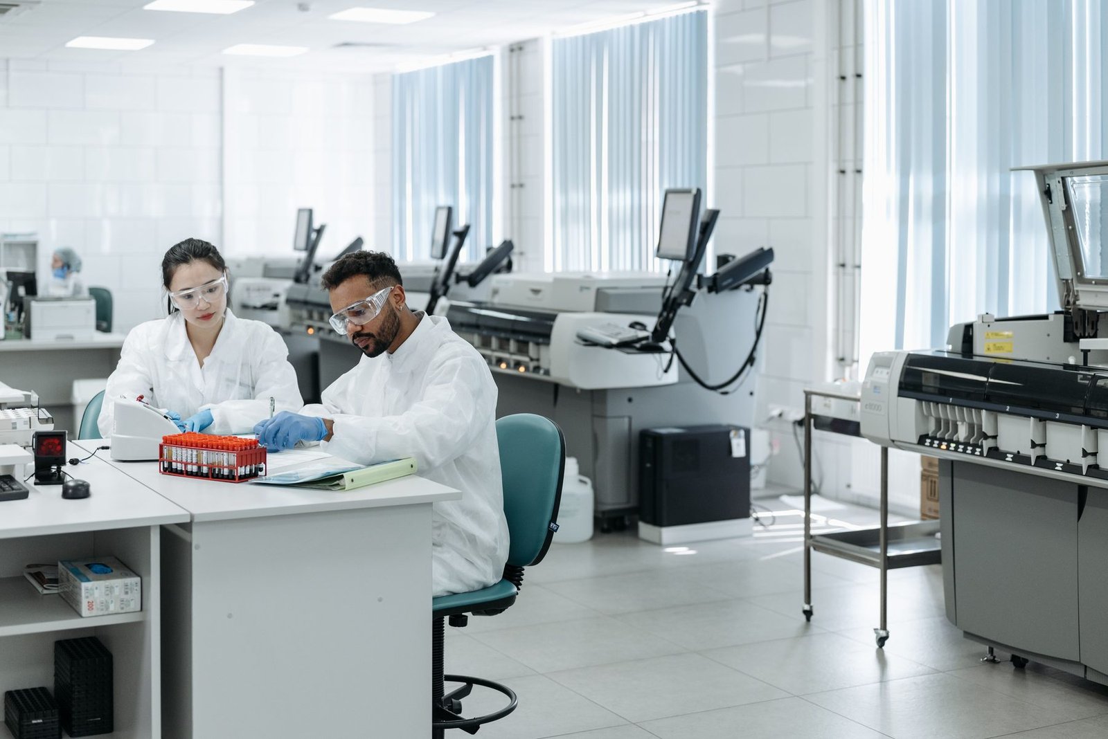 Researchers working in a modern healthcare laboratory